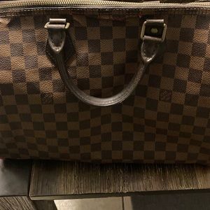 Louis Vuitton purse damaged